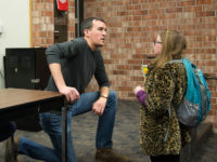 Drama Instructor - Carl Lindberg working with a student after Acting 1 DRA 130.