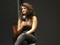 Des Moines Register reporter Andrea Sahouri speaks at DMACC Wednesday, Sept. 15, in the Black Box Theater.