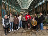 The 2025 London Study Abroad group pose in Covent Garden, London.