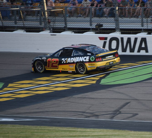 2023 NASCAR Cup Series champion Ryan Blaney en route to winning the inaugural Iowa Corn 350 at Iowa Speedway on June 16, 2024. Photo by Senior Master Sgt. Vincent De Groot via Wiki Commons.